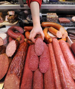 A saleswoman rearranges a display of Ger