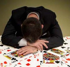 Businessman at Card Table